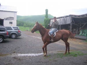 David Conner, Rockbridge Hunt huntsmans prepares to hit the trial